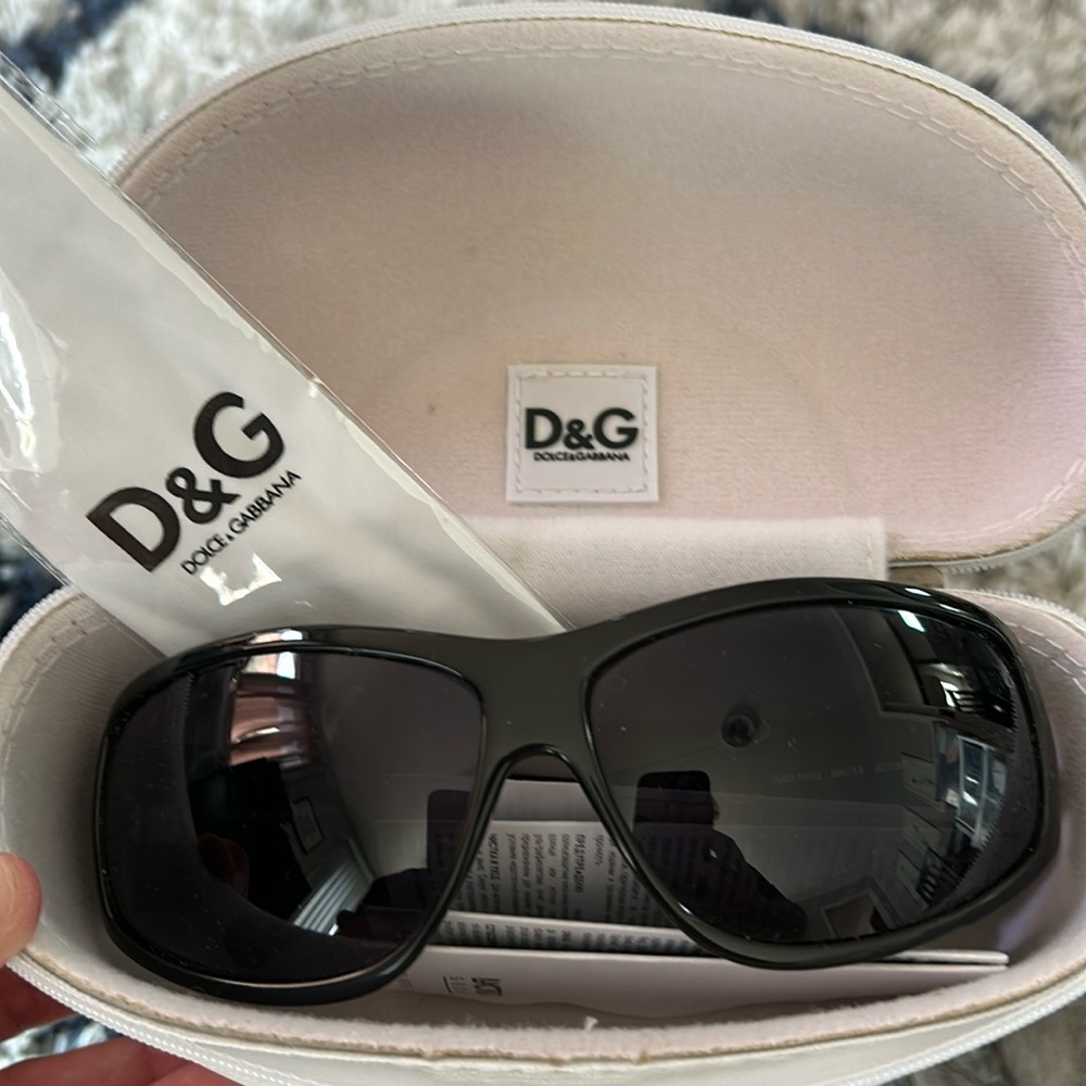 DG sunglasses, never worn.  Vintage.  Case has lots of blemishes.